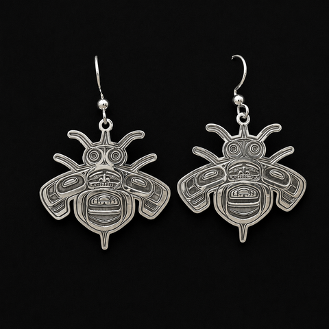 These sterling silver Bumble Bee earrings by Kolten Khasalus Grant bring a strong Northwest Coast design into an intimate, wearable scale front.