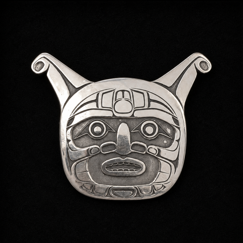 This sterling silver Sea Monster pendant by Kolten Khasalus Grant presents a bold Northwest Coast design in a compact, wearable form front.