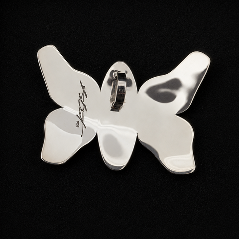 This sterling silver Butterfly pendant by Kolten Khasalus Grant presents a bold Northwest Coast design in a compact, wearable form back.