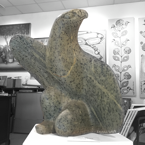 brazilian soapstone carving by master abraham ruben of a bird of prey about to take flight