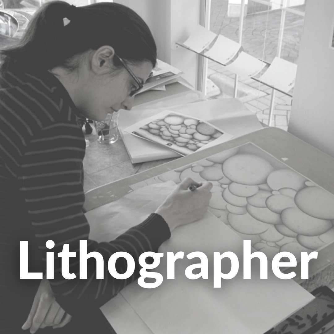 Photo of Anais Gerber preparing a lithograph print in her studio
