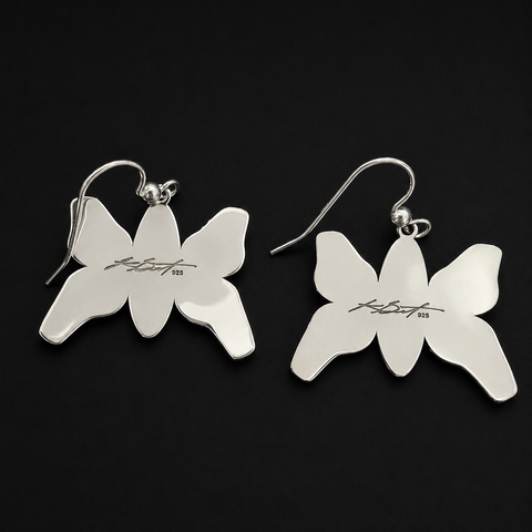 These sterling silver Butterfly earrings by Kolten Khasalus Grant bring a strong Northwest Coast design into an intimate, wearable scale back.