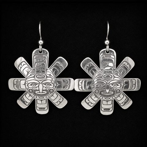 These sterling silver Sun earrings by Kolten Khasalus Grant bring a strong Northwest Coast design into an intimate, wearable scale.