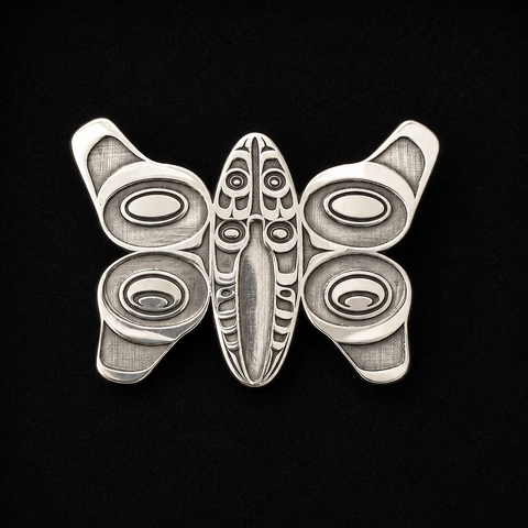 This sterling silver Butterfly pendant by Kolten Khasalus Grant presents a bold Northwest Coast design in a compact, wearable form front.
