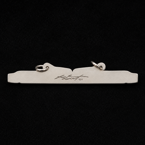 This sterling silver Thunderbird and the Long Life Giver pendant by Kolten Khasalus Grant presents a bold Northwest Coast design in a compact, wearable form back.