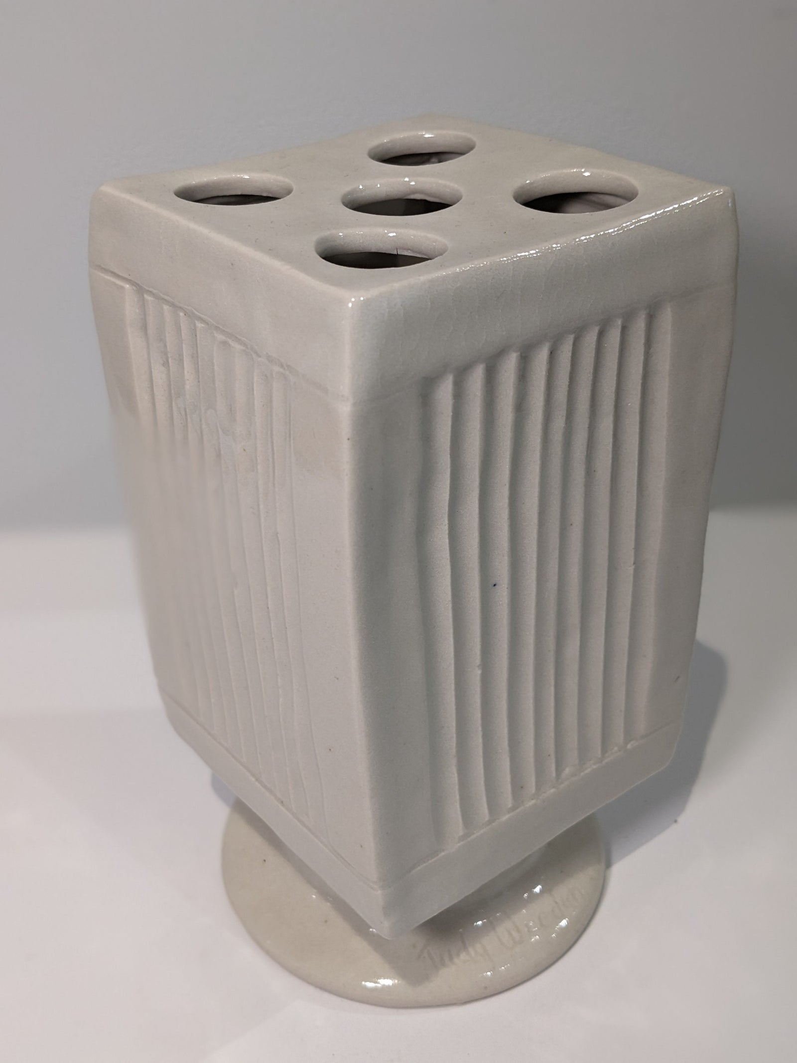 White Flower Block on Pedestal