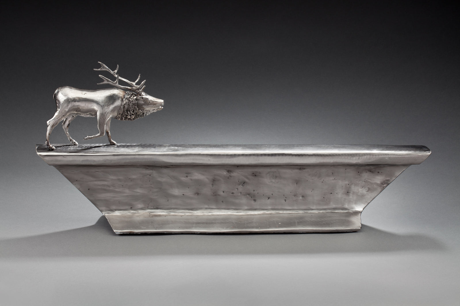 Peter McFarlane Reused Scrap Metal Sculpture with Elk Walking on Old Train Rail