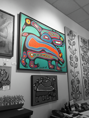 Original norval morrisseau painting called bear, fish and bird with gallery in background