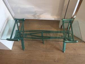 Peter McFarlane Reused Materials A Glass Table made of old wooden crutches painted emerald green