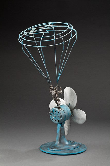 Peter McFarlane Reused Scrap Metal Sculpture with Parashute Man Landing on Re-purposed Fan