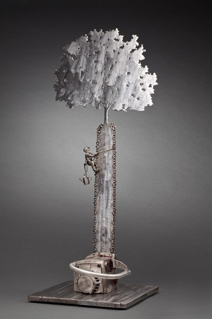 Peter McFarlane reused scrap metal sculpture with reused chainsaw turned into a tree