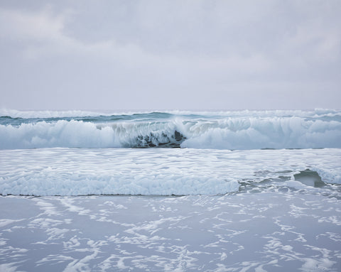 Acrylic high realism painting by renown Salt Spring Artist Carol Haigh of beach waves after a storm